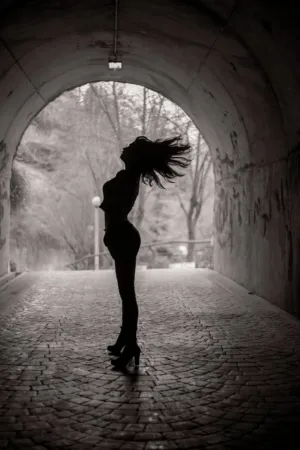 Silhouette In Tunnel