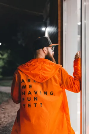 Man In Orange Jacket