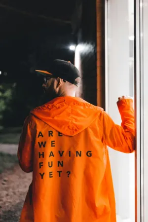 Man In Orange Jacket