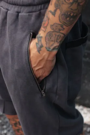 Tattooed Hand In Pocket