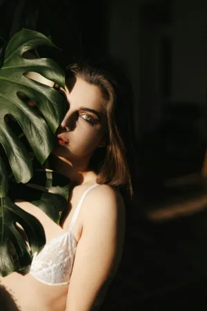Sunlit Model With Monstera Leaf