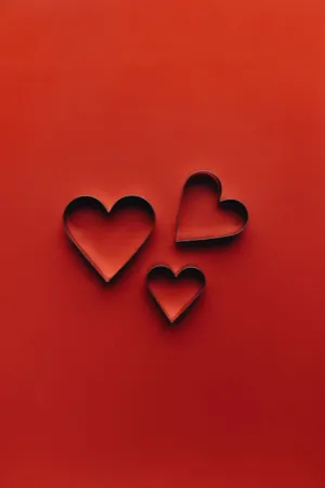 Heart Shapes On Red Background