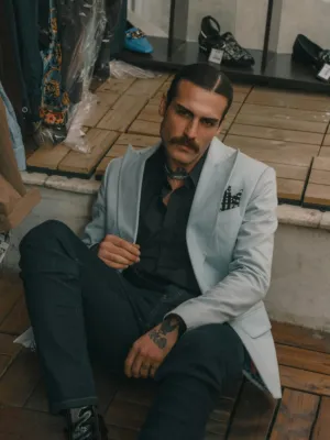 Sleek Male Model In Light Blue Blazer