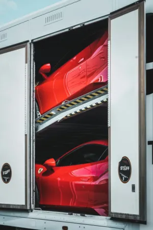 Red Sports Cars In Transporter