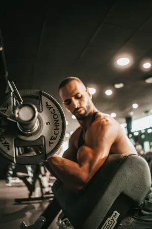 Muscular Man Lifting Weights