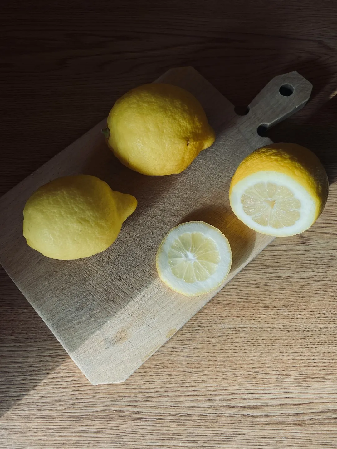 Lemons On A Cutting Board