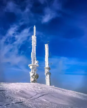 Snow-Covered Communication Towers