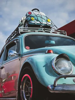 Vintage Car With Toy Car On Roof