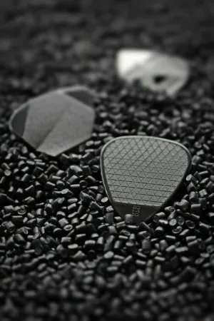Guitar Picks On Black Gravel