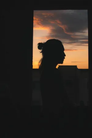 Silhouette Of A Person At Sunset