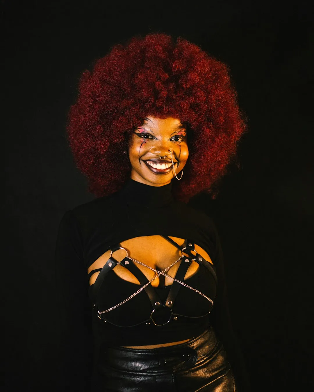 Red Afro And Black Outfit