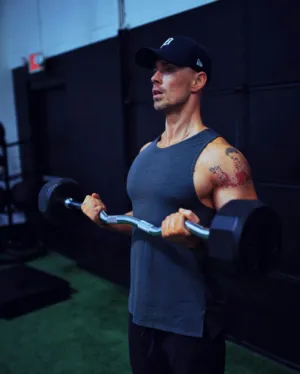 Muscular Man Lifting Weights
