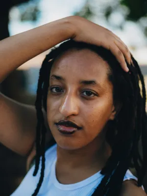 Portrait Of A Woman With Dreadlocks