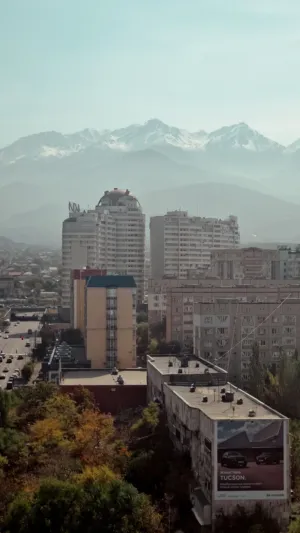 Cityscape With Mountains