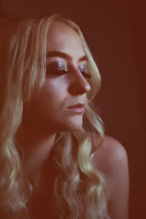 Blond Woman With Glitter Eyeshadow