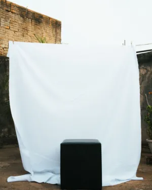 White Backdrop With Black Cube