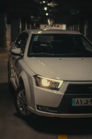White Car In Parking Garage