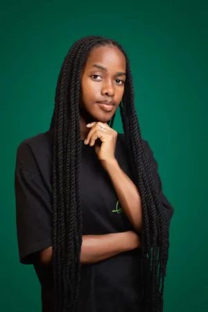 Portrait Of A Young Woman With Braids