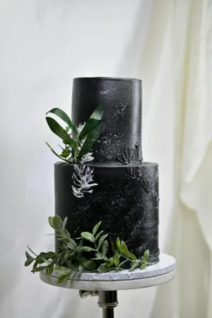 Black Wedding Cake With Greenery