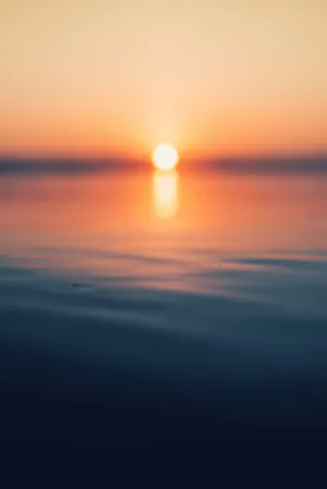 Sunset Over Calm Water
