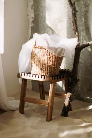 Cozy Basket On A Wooden Stool