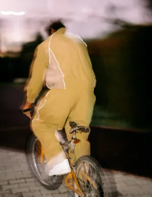 Bicycle Rider In Yellow Suit