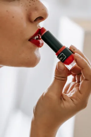Applying Red Lipstick