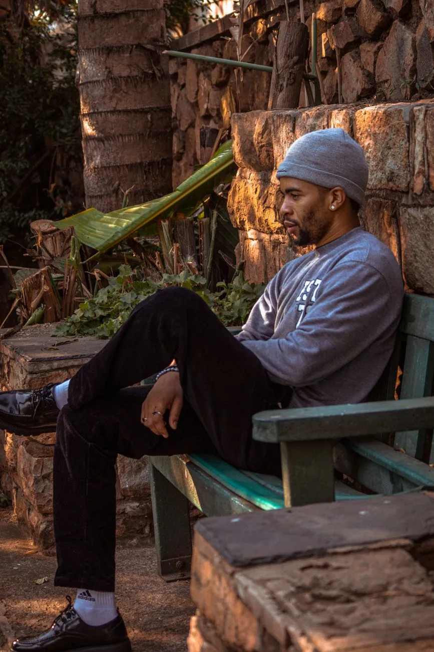 Man In Grey Sweater And Beanie