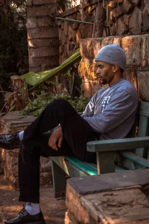 Man In Grey Sweater And Beanie