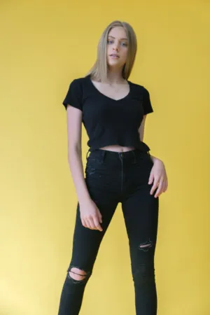 Black Outfit On Yellow Background
