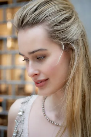 Elegant Blonde In A Sparkling Dress