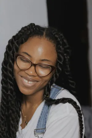 Smiling Woman With Braids