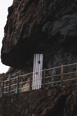Rocky Cliffside With Modern Art