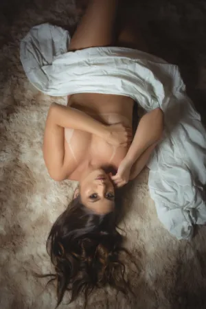 Nude Woman Lying On Fur