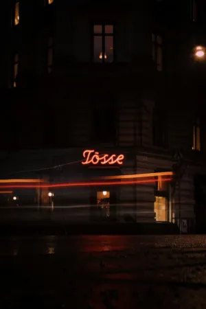 Nighttime Cityscape With Neon Sign
