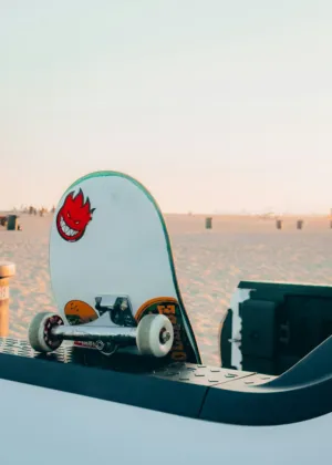 Skateboard On Car At Beach