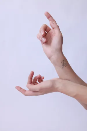 Hands With Tattoo