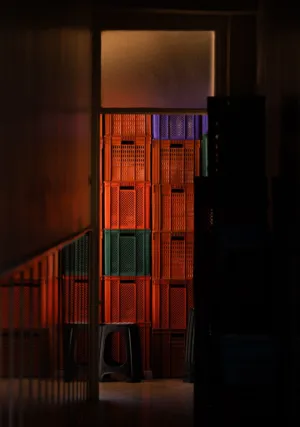 Stacked Crates In A Dimly Lit Room