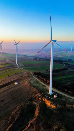 Wind Turbines At Sunset