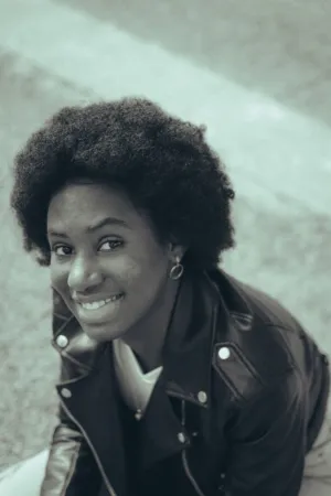 Smiling Woman In Leather Jacket