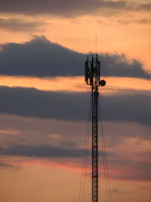 Cell Tower Silhouette At Sunset