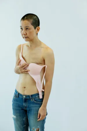 Bare-Chested Woman In Jeans