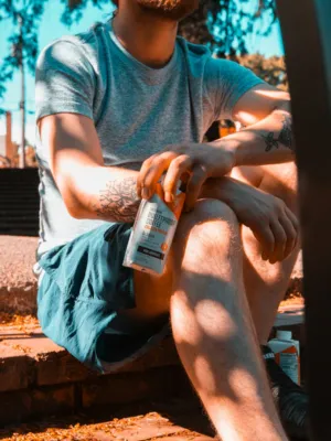 Man With Tattoo Holding Bulletproof Coffee