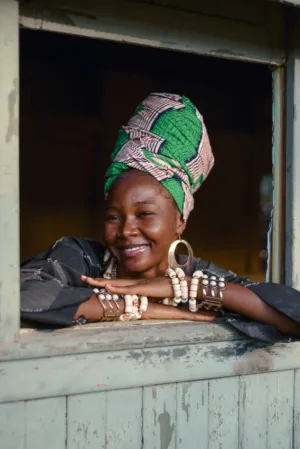 Smiling Woman In Traditional Headwrap