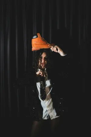 Person With Boot On Head
