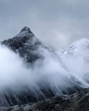 Mountain Peak In Clouds