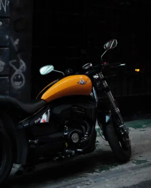 Yellow Motorcycle In Urban Setting