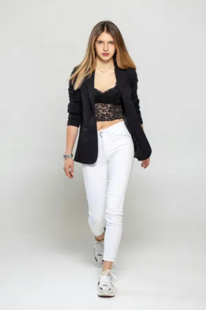 Fashion Model In Black Blazer And White Jeans
