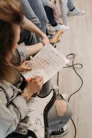 Musicians Writing Sheet Music