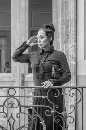 Woman On Balcony